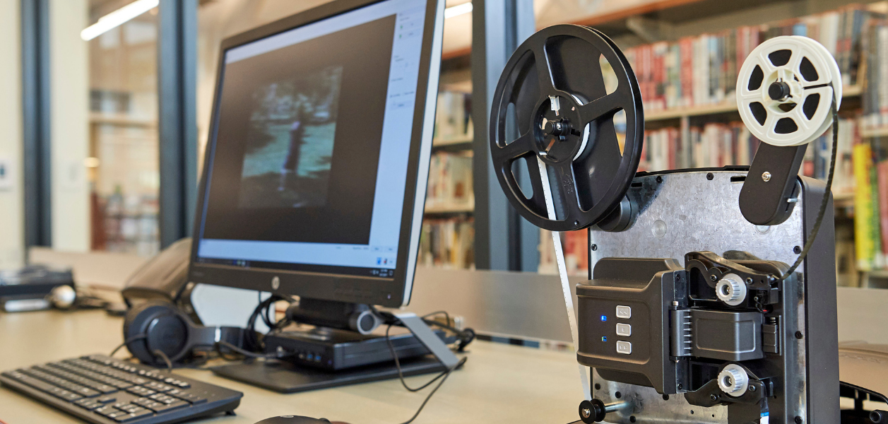 Cuyahoga County Public Library's Mandel Memory Lab is an example of the common "do-it-yourself" model where patrons are empowered to learn about digitization and preservation before embarking on respective projects themselves. (Photo Courtesy of CuyahogaLibrary.org for Educational Use)