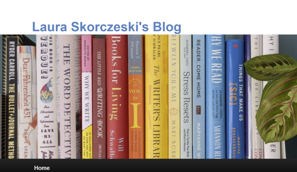 A shelf of books about reading and writing organized in rainbow order.