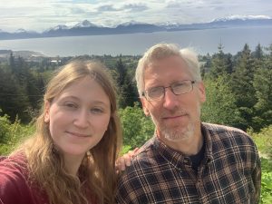 Author and his daughter in their town in Alaska.