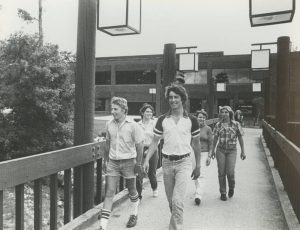 Students walking on bridge