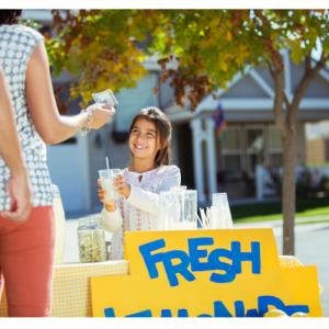 Child at a lemonade stand
