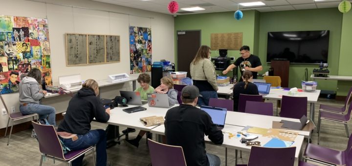 PAtrons using library provided computers and equipment to pursure creative projects.