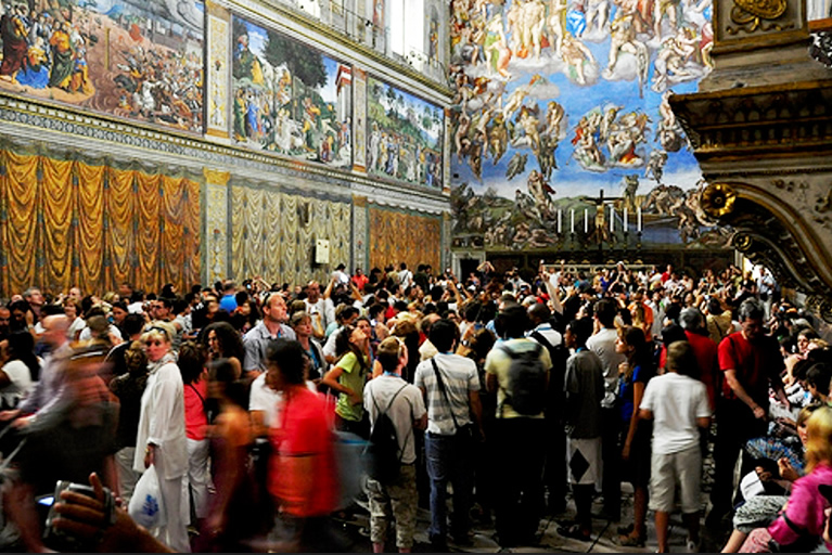 Visitors inside the Sistine Chapel